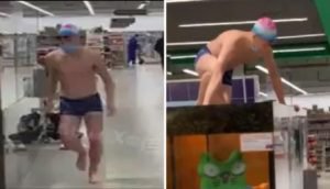 Голий пранкер в супермаркеті Херсона пірнув в акваріум з коропами. Відео