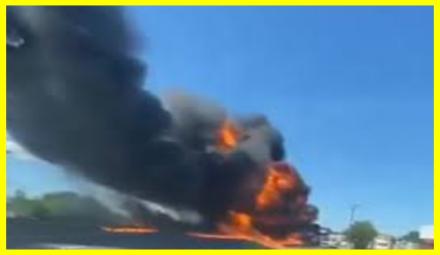 The rescue plane burst into flames in the air and crashed right onto the highway