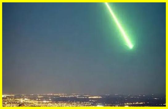 A ball of green fire flew over the city